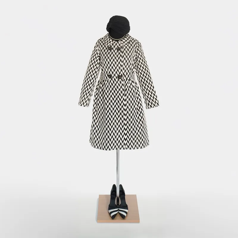 Elegant vintage style: Black and white retro coat with a graphic pattern